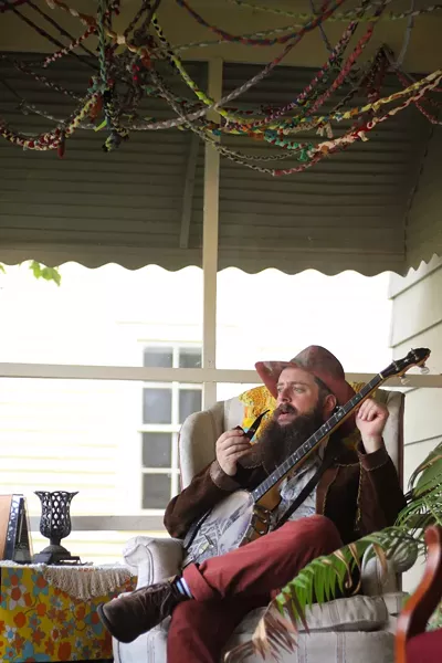Mike Savino of Tall Tall Trees cozies up with his custom banjotron (it lights up!).