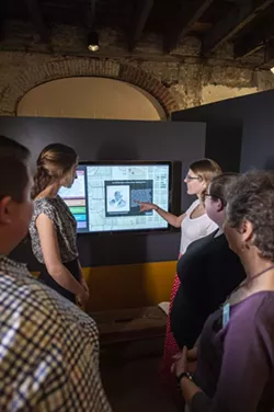A new touchscreen kiosk explains the history of the house and everyone who lived and worked in it. - PHOTO BY GEOFF L. JOHNSON