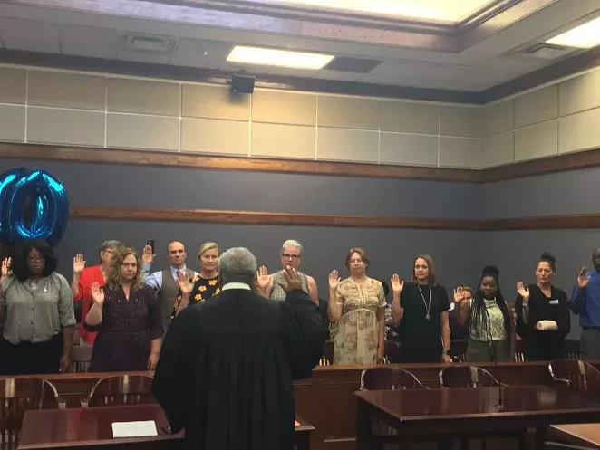 As soon as CASA volunteers are sworn in, they are ready to take their first case. Photo courtesy of CASA.