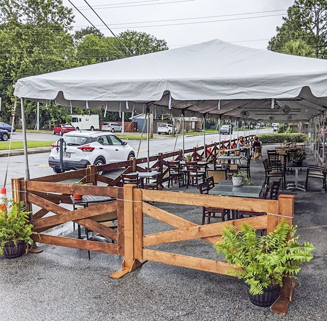 The 5 Spot's tent allows for outdoor dining in Habersham Village.