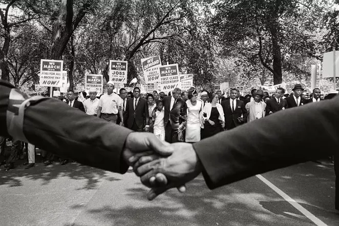 "Jackie Robinson, Rosa Parks, and Other Activists March on Washington" by Steve Schapiro, 1963. Copyright of the artist and courtesy of Laney Contemporary, Savannah, and Jackson Fine Art, Atlanta.