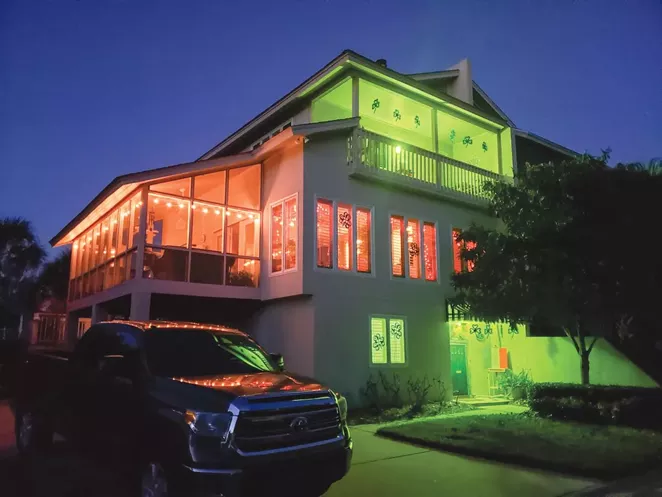 Residents on Tybee Island decorate their homes green in lieu of a St. Patrick’s Day parade this year. - PHOTO BY CATHY LEWIS