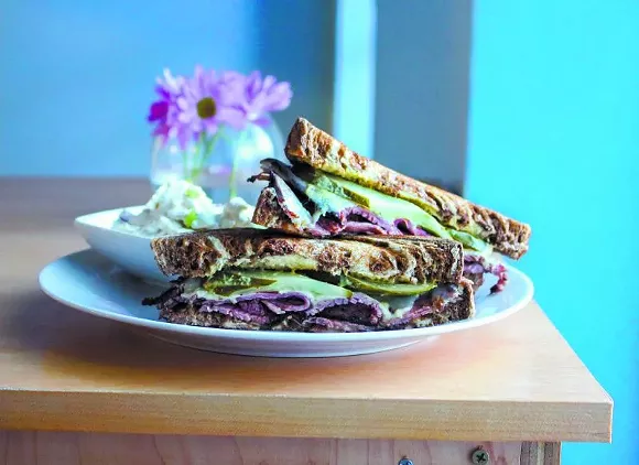 A taste of New York City with the Hot Pastrami Sandwich. All breads, like this marbled rye, are ordered from a bakery in Tribeca.