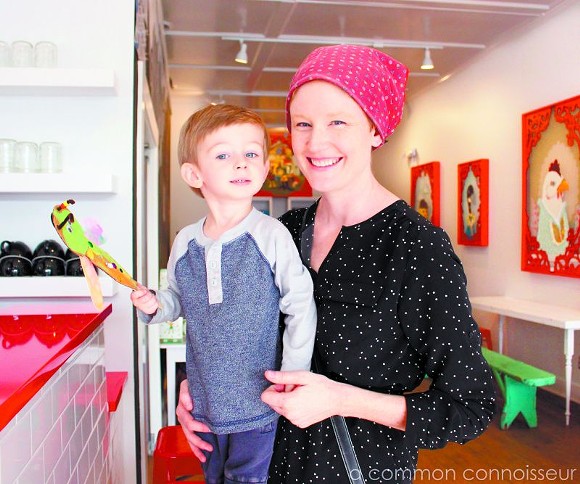 Owner of the Foxy Dynasty, Jennifer Jenkins, enjoys the new space with her son, Ison.