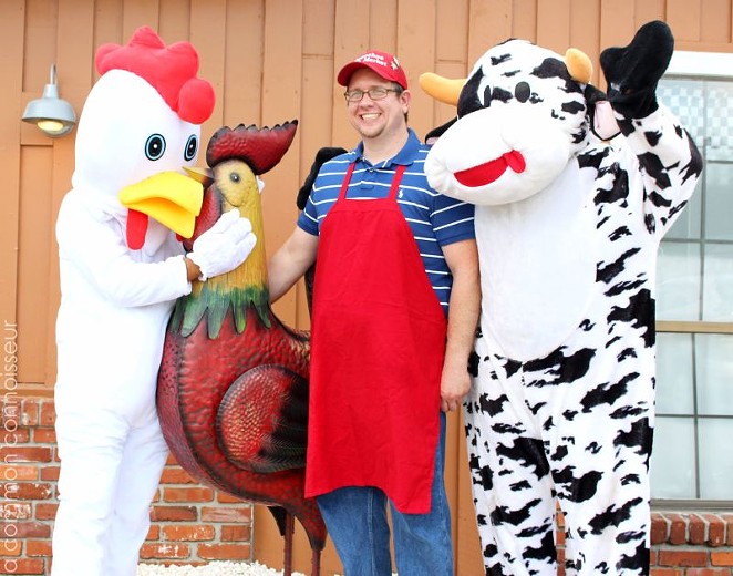 Matthew McClune (middle) and brother Andrew (cow) follow their father’s footsteps with the family business.