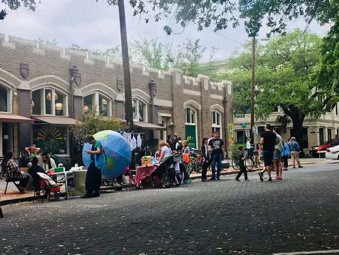 Park Ave between Drayton and Bull streets was closed to cars, but not to people, during the Earth Day Festival in Forsyth Park. People strolled, pedaled, talked, and enjoyed the street. Cars were excluded from one block, but the world did not end.