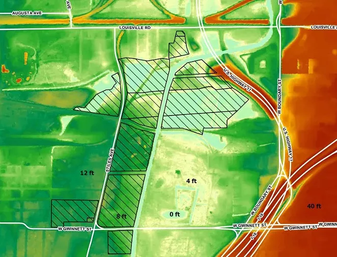 Elevation map of the site with blue representing low elevations and red representing high elevations. City-owned parcels in black hatching. Source: GA Tech