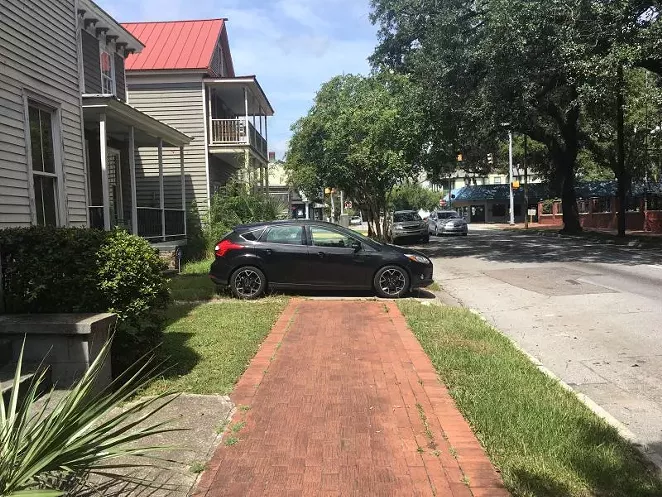 People who walk in Savannah frequently face barriers, like this car parked on the Anderson Street sidewalk. When Bird e-scooters arrive in Savannah will they add to the problems or provide a needed mobility option?
