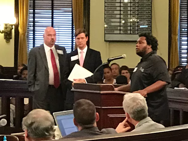 Stage on Bay owner Charles Schmitt, far left, during one of the contentious hearings last year over the venue's liquor license
