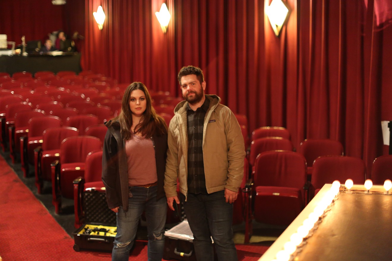 Katrina Weidman and Jack Osbourne of the Travel Channel’s paranormal investigative show “Portals to Hell” in the Historic Savannah Theatre. Photo provided by Discovery +