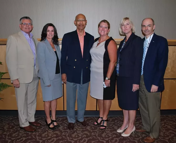 (L to R) Chatham County Manager Lee Smith, Memorial Health Public Policy Director Jennifer Wright, CGIC Vice Chair Otis Johnson, CGIC director Tara Jennings, Assistant County Manager Linda Cramer and CGIC chair Mike Kemp have committed to creating an action plan to meet the goals of Chatham County for 2035. - PHOTO BY NANCY FULLBRIGHT