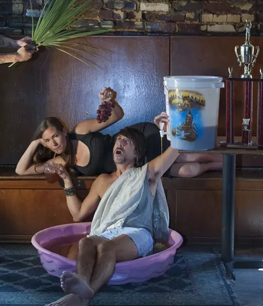 The party god and goddess themselves, Wes and Heather in Hang Fire Bar - GEOFF L. JOHNSON