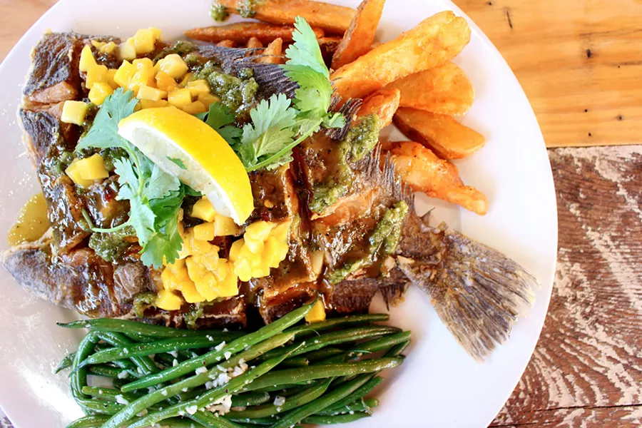 Dinner is served: Crispy Scored Flounder with Rakies Island sauce and chimichurri.