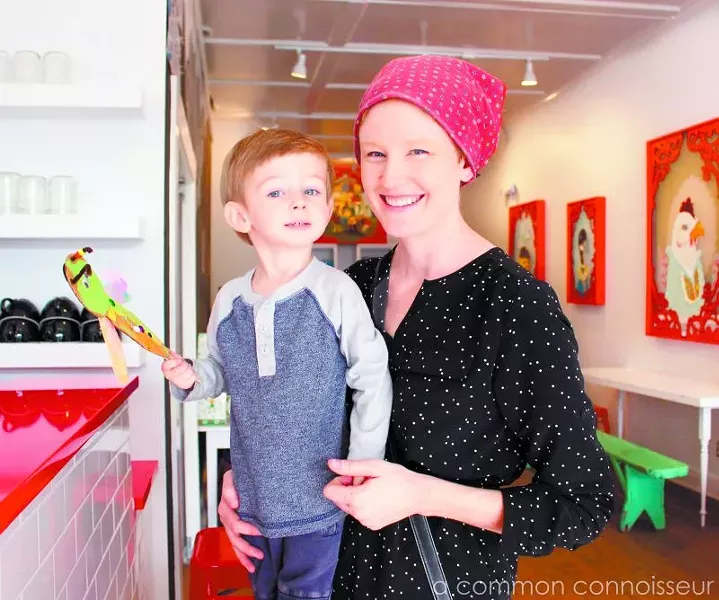 Owner of the Foxy Dynasty, Jennifer Jenkins, enjoys the new space with her son, Ison.