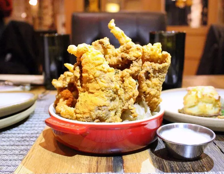 The Husk Fried Chicken Skins with white barbeque sauce.