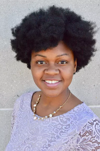 Student Tenyah Brown conducts two pieces in All You Need is Love.