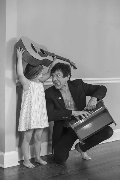 Cutting up with Zelia. - GEOFF L. JOHNSON