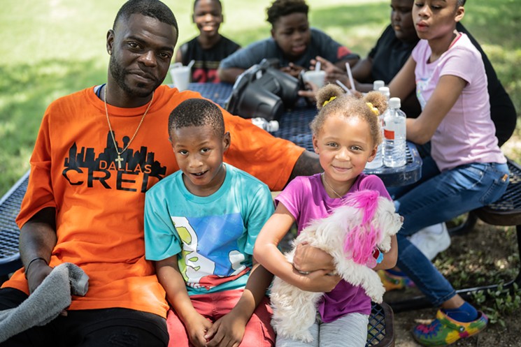 Damion Hall connects with South Dallas kids and families. - MIKE BROOKS