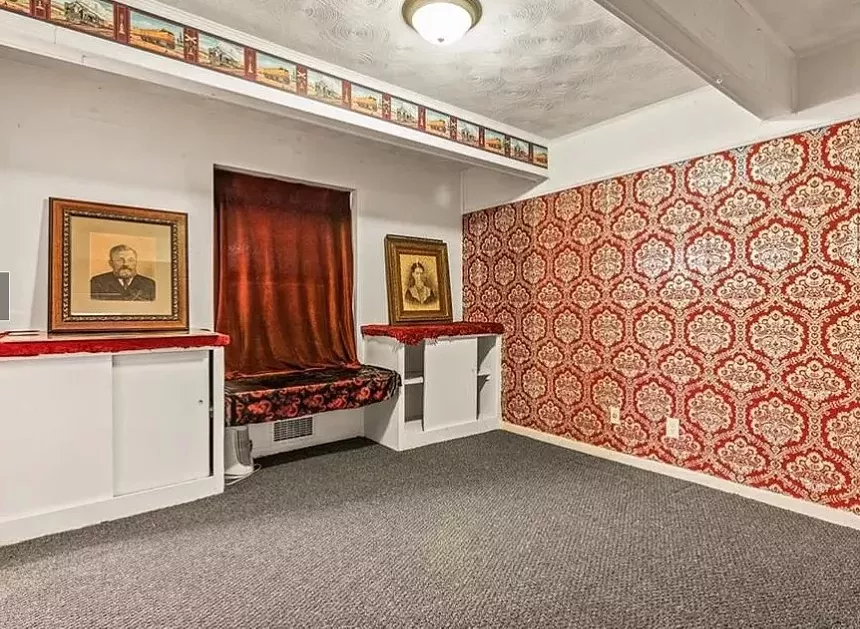 The home's current owner Robert "Videobob" Moseley says they kept a lot of the home's original 1960s style wallpaper to contribute to their eclectic plans for the interior. - MICHAEL ROUYRE