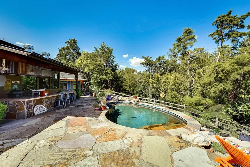 Bon Aire Drive has a pool and an outside bar.  - ZERO 3