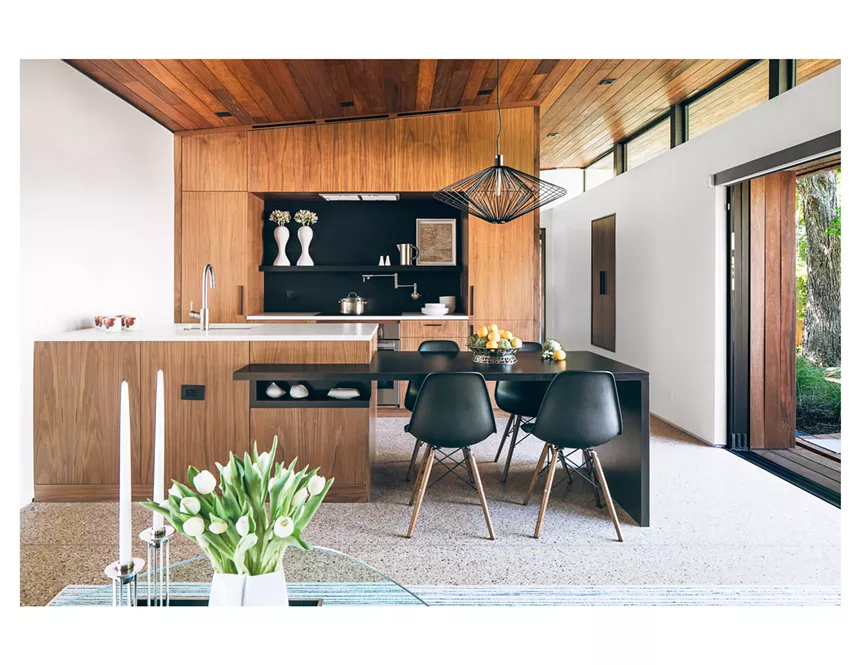 The kitchen and dining area open onto the patio terrace.  - PARRISH RUIZ DE VELASCO