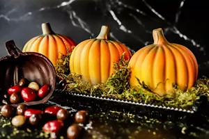 Children can paint dark chocolate pumpkins at Kate Weiser Chocolate on Saturday.  - KAYLA ENRIGHT