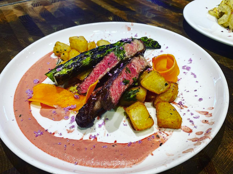 Resendiz created many wood-fired dishes, like this ribeye, while at Cattivella. - ZURI RESENDIZ/INSTAGRAM