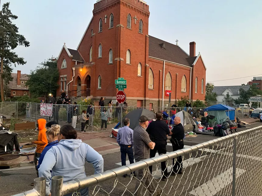 Denver authorities swept a homeless encampment outside Four Winds American Indian Council on August 31. - CONOR MCCORMICK-CAVANAGH