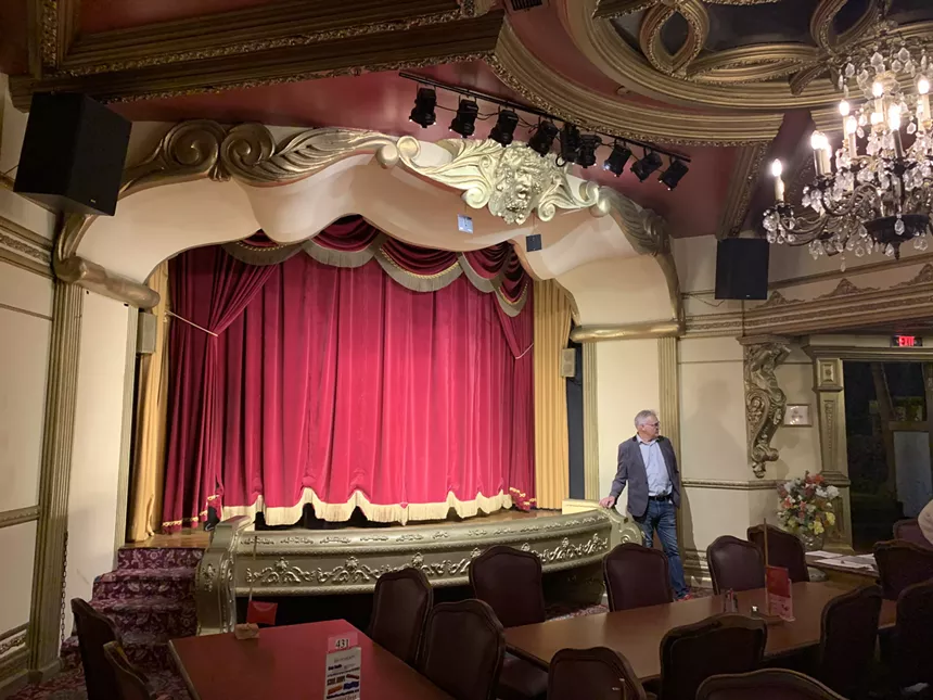 David Thomas, aka the Professor of Fun, pontificates on the meaning of Casa Bonita by the stage. - PATRICIA CALHOUN