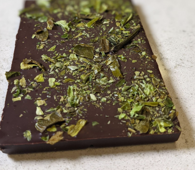 The Colorado Pueblo Chile Bar contains hand-roasted Pueblo chiles from Mauro Farms. - MOKSHA CHOCOLATE
