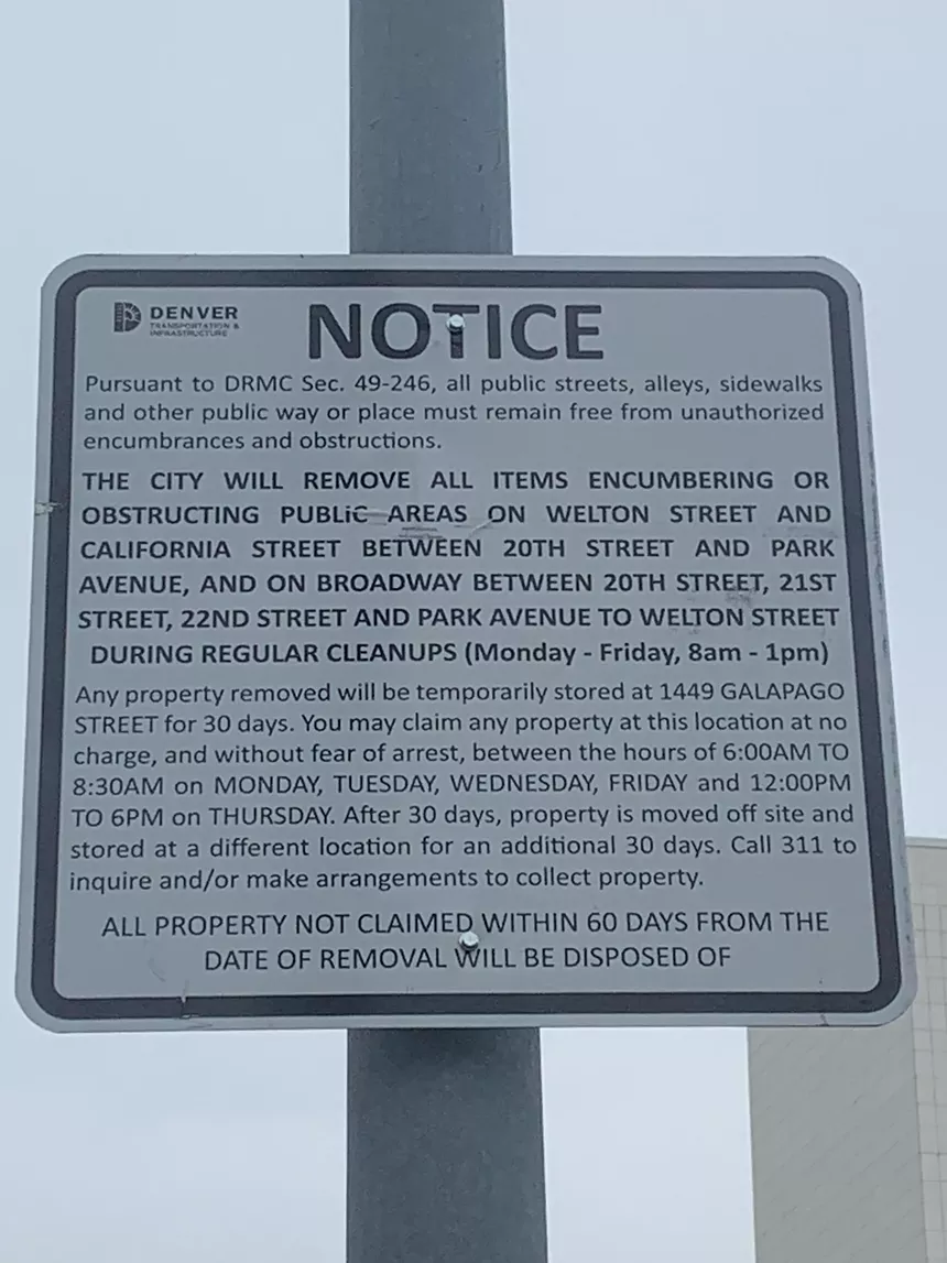 The City of Denver has set up permanent signage to notify of sweeps in a section of Five Points. - CONOR MCCORMICK-CAVANAGH