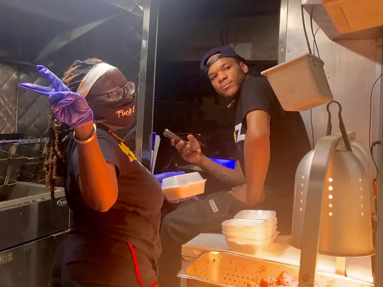 Williams and his crew prepare meals and deliver them to the homeless every night after work. - PHOTO BY DEVAUGHN DOUGLAS