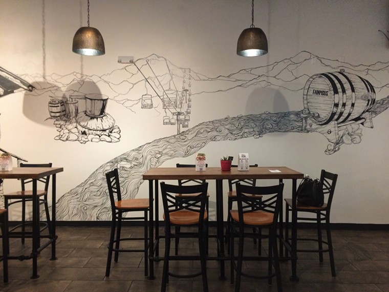 A mural copied from a hand-drawn sketch covers the wall at Fainmous Barbecue. - PHOTO BY LORRETTA RUGGIERO