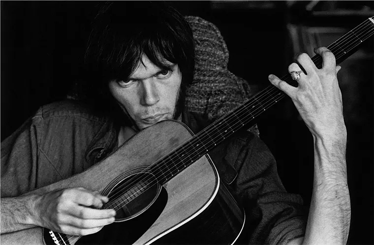 "Neil Rehearsing for Deja Vu at Stephen's House IV," 1969, Studio City, Los angeles. - PHOTO BY GRAHAM NASH/COURTESY OF JENSEN COMMUNICATIONS