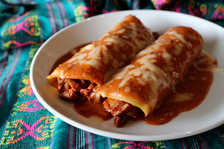 Nothing says Happy Holidays, Houston!  like enchiladas.  Okay, maybe tamales.  - PHOTO BY PAULA MURPHY