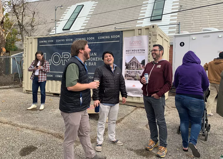 Aaron Franklin (right) has fun with the fans. - PHOTO BY LORRETTA RUGGIERO