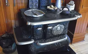 The kitchen in the Hemingway birthplace features the original stove and other Victorian fixtures. - PHOTO BY JOE CAMPER