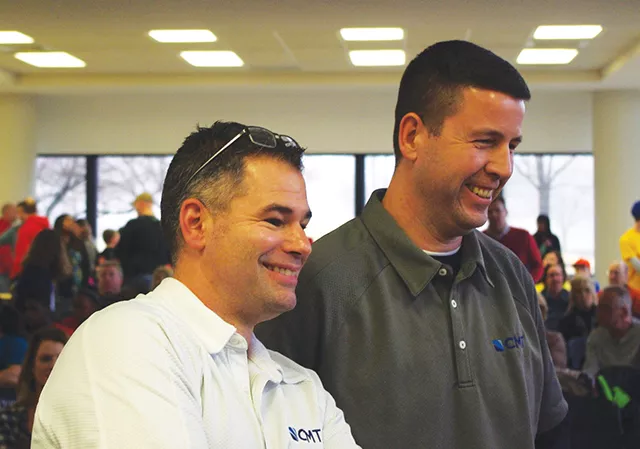 Dan Hartman’s engineers Jim Michael and Chris Groth from Crawford, Murphy & Tilly enjoy the running of the Rubes on contest day.