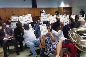Residents were angry and surprised by a proposal that would put a homeless shelter in their neighborhood. - PHOTO BY BRUCE RUSHTON