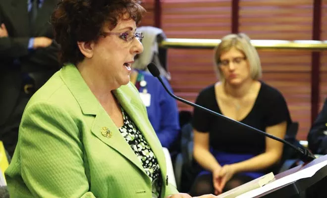 Toni Hoy speaks to lawmakers during a legislative hearing on a bill to end “planned abandonment” of adopted children who need intensive care for emotional disturbances. - PHOTO BY PATRICK YEAGLE