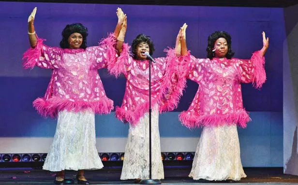 Calia Cole (Lorell), Fania Bourn (Deena) and Tuesdai Perry (Effie) perform as the Dreamettes in the Muni’s Dreamgirls. - PHOTO BY DONNA LOUNSBERRY