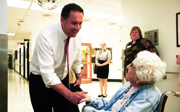 Democrat David Gill toured community hospitals across the 13th District in July to highlight the federal budget cuts proposed by Republican vice presidential nominee Rep. Paul Ryan of Wisconsin. Rodney Davis, Gill’s opponent, supports Ryan?