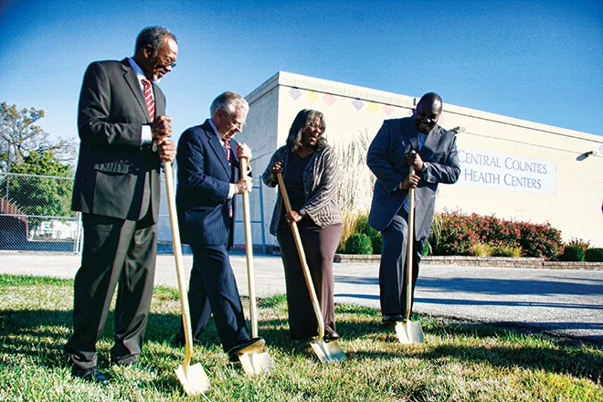 Breaking ground on the new expansion for Central Counties Health Centers is (from left to right) CCHC board chairman Bobby Hall, Springfield mayor Michael Houston, Ward 3 Ald. Doris Turner, and CCHC president and CEO Craig Glover. - PHOTO BY PATRICK YEAGLE