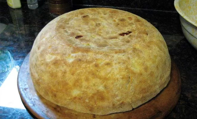 Timballo is made with a casing of fresh pasta filled with layers of pasta, hardboiled eggs, cheeses, meatballs, sausages and meat sauce. - PHOTO BY MBARRIEAU VIA WIKIPEDIA.ORG