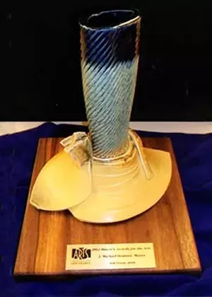 The award presented to this year’s recipients of the Mayor’s Awards for the Arts is “Bluelip Vase,” created by UIS ceramic artist Bob Dixon. Each of the seven pieces created by Dixon for the awards was sli