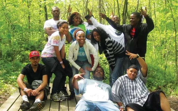Participants in the Springfield Urban League's recent Afia Empowerment Retreat enjoy some down time. During the retreat, which was held at Carlinville's Lake Williamson, the young women took part in the SISTA Project, while the young men participated in t - COURTESY SPRINGFIELD URBAN LEAGUE