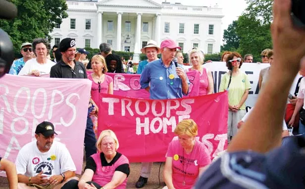 Daniel Ellsberg at the microphone during a 2006 Independance Day Troops Home Fast Hunger Strike at the White House. - PHOTO BY ELVERT XAVIER BARNES
