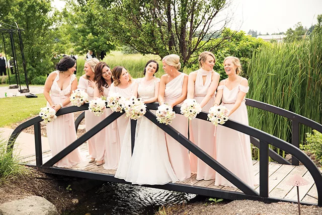 Sarah Raftis and her bridesmaids at Metamora Fields golf club in Metamora. - PHOTO BY MATT DEBACKERE PHOTOGRAPHY