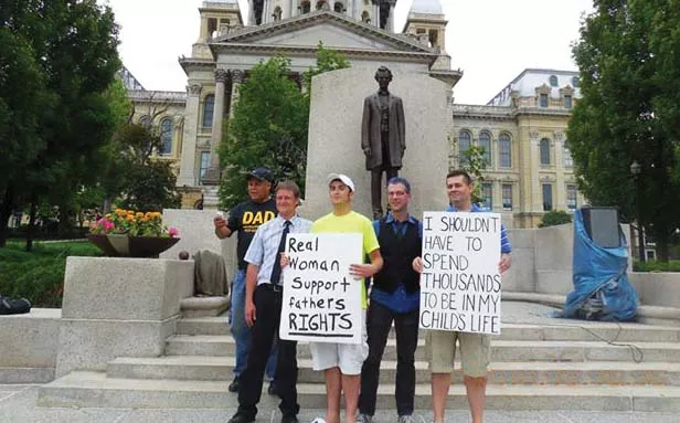 Left to right are Captain Tony Taylor, fathers rights activist from Chicago; Steven Westerfield, Illinois Fathers area coordinator from Springfield; Shane Bouvet, Illinois Fathers member from Taylorville; Todd Bottom, a doctoral student at DePaul Universi - PHOTO PROVIDED BY ILLINOIS FATHERS