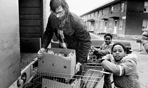 Doug Finke, today a SJ-R Statehouse reporter, and two helpers make Friend-In-Deed deliveries to the John Hay Homes in 1979. - PHOTOS COURTESY OF THE SANGAMON VALLEY COLLECTION.